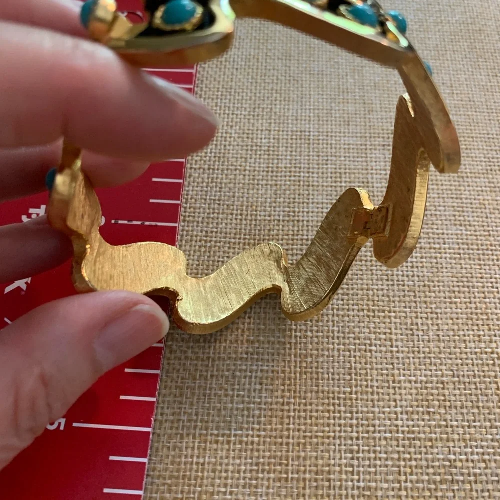 Striking vintage turquoise color black and gold cuff bracelet